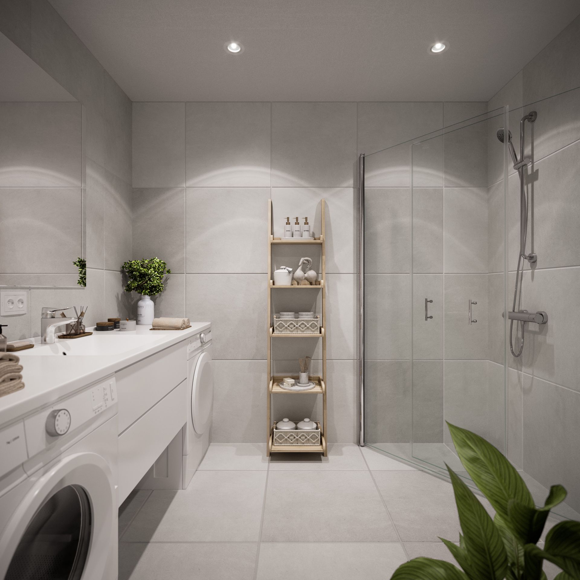 Delikate og flislagte bad, med lyse overflater, opplegg for vaskemaskin, downlights i tak og vegghengt toalett. Varmekabler i gulv og stikkontakter i baderomsinnredning.